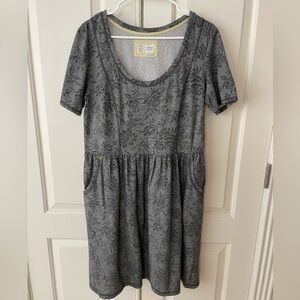 Scoop neck, so comfortable and it has pockets.